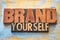 Brand yourself word abstract in wood type