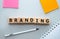 BRANDING word made with building blocks on office table