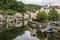 BRANTOME, FRANCE - MAY 27, 2019: The old town of Brantome and his stone houses along the river Dronne, Dordogne, Aquitaine, France