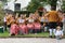 A brass band in traditional costumes performs on a country festival. Austria.