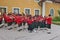 A brass band in traditional costumes performs on a country festival in Obertrum, Austria.