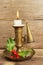 Brass candlestick and burning candle