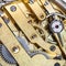 Brass clockwork of old mechanical watch