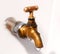 Brass faucet. As the drops of water.