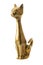 Brass figure of the metalic cat over the white