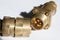 Brass four-pin electrical connector.