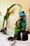 Brass frog guitarist