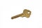 A brass house key isolated on a white background