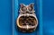 Brass knocker in the shape an owl