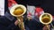Brass orchestra in funny hats playing Christmas carols creating holiday spirit