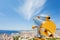 Brass telescope overlooking cityscape of Marseille