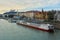 Bratislava castle over river Danube with docked ship