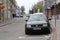 Bratislava, Slovakia - April, 2011: cars parked on narrow old street on slope.