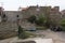 Bratislava, Slovakia - April, 2011: cars parked near ancient wall.