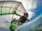 Brave hang glider pilot takes selfie while flying high above ground