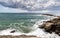 Brave sea with clouds and blue sky in Roses, Costa brava