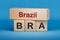 Brazil and BRA symbol. Concept words Brazil and BRA on wooden blocks.