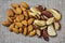 Brazil nuts Bertholletia excelsa, aka Castanha-do-Brazil or Castanha-do-Para, and almonds in detail. Handful or portion of Brazil