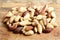 Brazil nuts on wooden background. Shelled brazil nuts