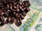 Brazil roasted coffee beans placed on banknotes