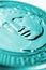 Brazilian 1 real coin close-up. The reverse of the coin with the Figure of the Republic. Light turquoise tinted vertical