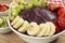 Brazilian acai and fruits in wood background close 1