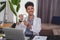 Brazilian Black Doctor or Veterinarian Working at Home. Young Man Working During the day at desk With Laptop