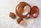 Brazilian cocada coconut candy placed in a ceramic pot on a table with white tablecloth, top view