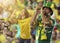 Brazilian couple Celebrating on a stadium