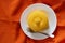 Brazilian Couscous Cuscuz Brasileiro on orange background. Typical Northeast Brazilian dish. Corn couscous.