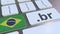 Brazilian domain .br and flag of Brazil on the buttons on the computer keyboard. National internet related 3D rendering