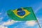 Brazilian flag with blue sky background Rio de Janeiro Brazil