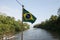 Brazilian flag in a boat in amazon