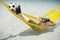 Brazilian Footballer Relaxing with Soccer Balll in Beach Hammock