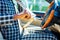 brazilian man fastening seat belt in car and ready to move