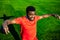 brazilian man goalkeeper catches the ball in the stadium during a football training