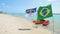 Brazilian and Pernambuco state flags at the beach, Ipojuca PE Brazil