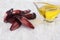 Brazilian Pinion fruit and olive oil in coarse salt background