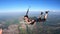 A Brazilian skydiver in free fall, on a summer day. Smiling and confident