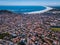 Brazilian small beautiful City Arraial do Cabo . Aerial drone photo from above city line. Red Roofs, narrow streets