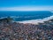 Brazilian small beautiful City Arraial do Cabo . Aerial drone photo from above city line. Red Roofs, narrow streets