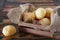 Brazilian snack cheese bread (pao de queijo) in wooden box with