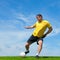 Brazilian soccer football player kicking a ball