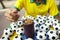 Brazilian Soccer Player Eating Acai with Footballs