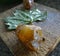 Brazilian stone and dry leaf on rustic wood