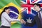 Brazilian woman shaking hands with Australian person