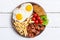 Breackfast : french fries , bacon , fried eggs