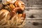 Bread. Bakery Bread border on a Wooden Table. Assortment Various Bread and Sheaf of Wheat Ears close up