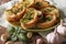 Bread with basil and garlic closeup on plate. Horizontal