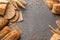 Bread border on stone table with copy space background. Bakery, cooking and grocery store concept